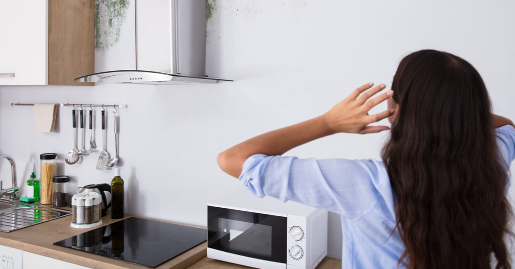 A-girl-stressed-and-looking-at-damaged-walls-1024x536