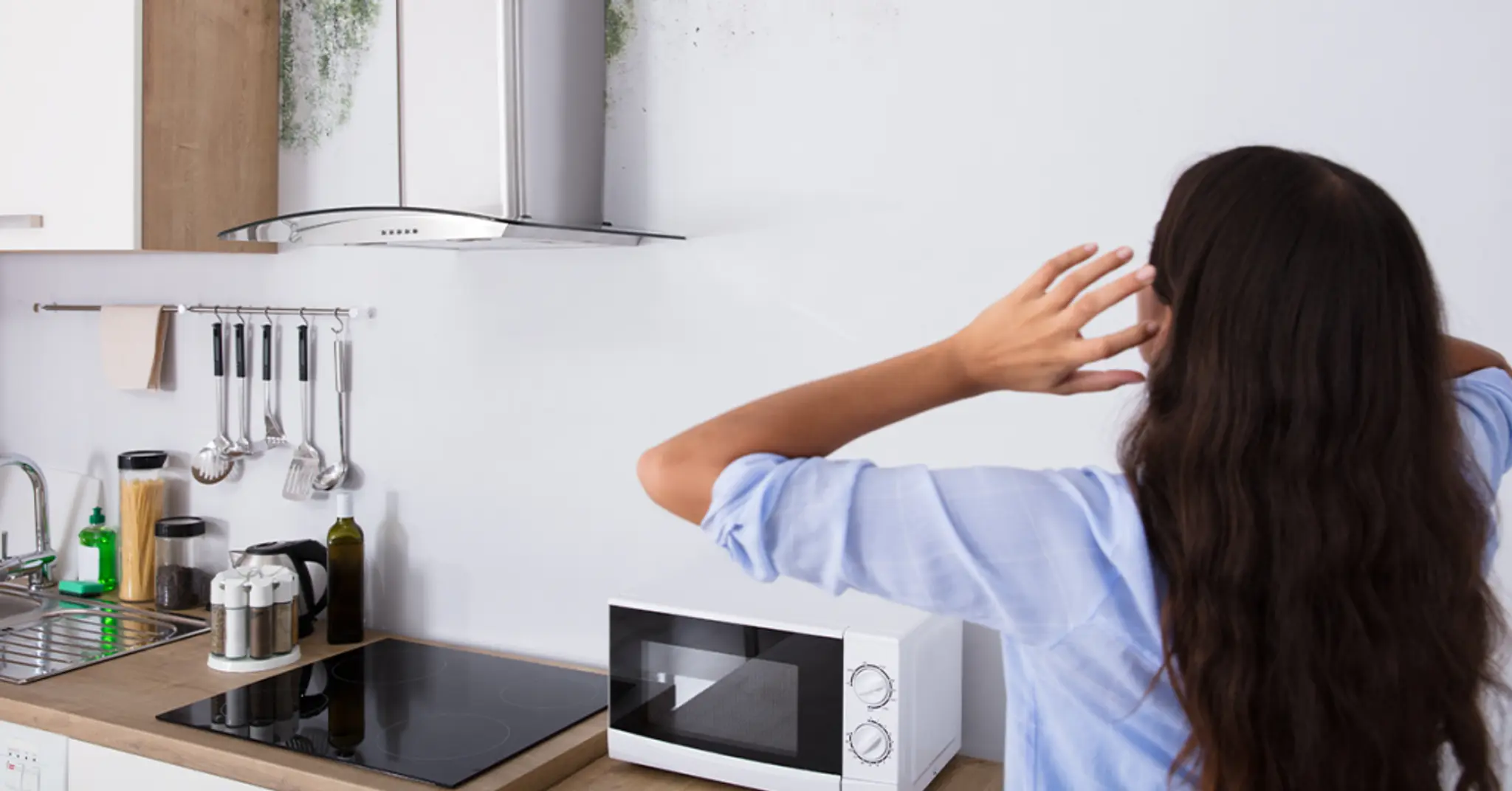 A-girl-stressed-and-looking-at-damaged-walls-1024x536