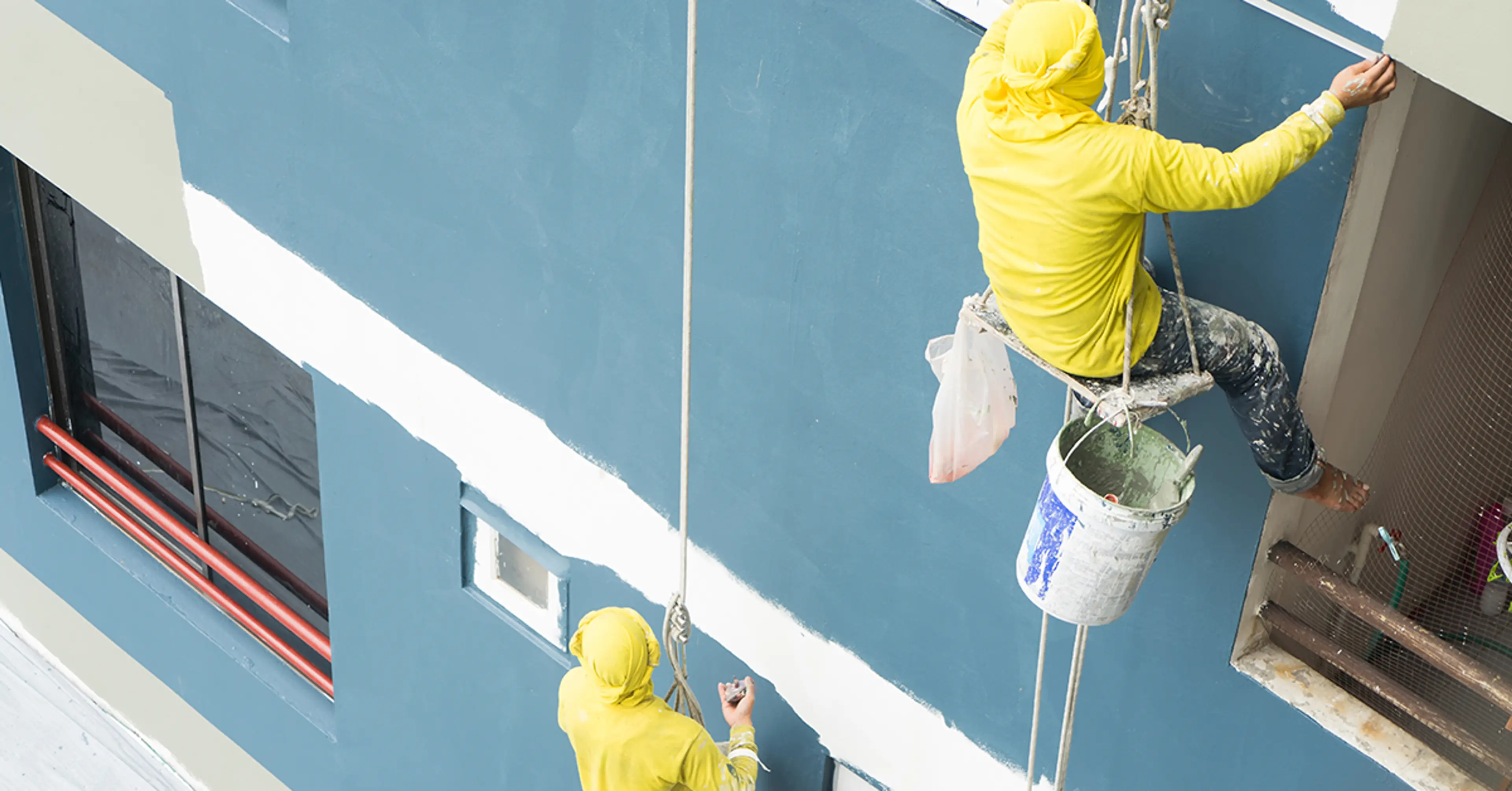 Professional-painters-painting-a-wall