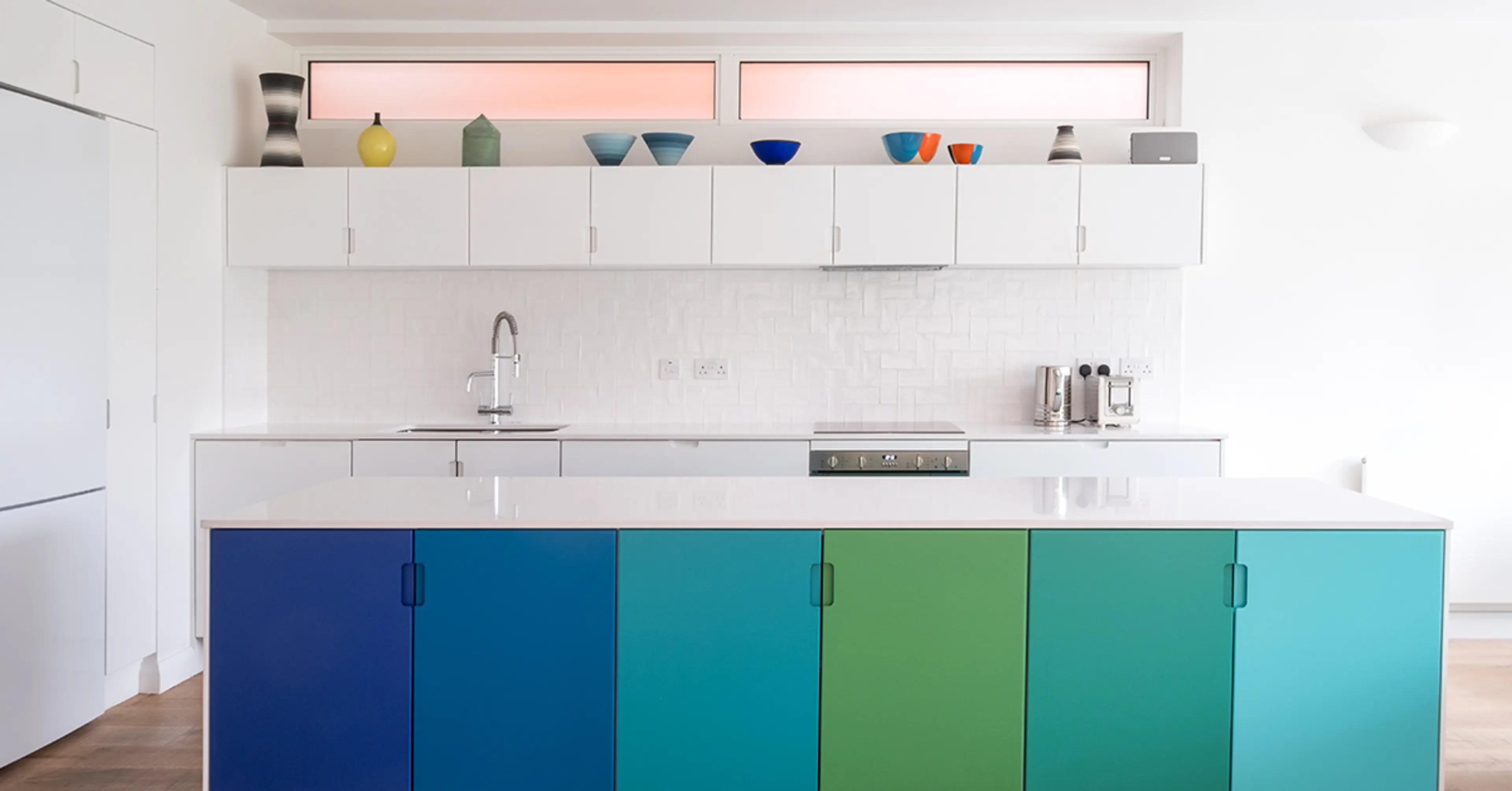 Shades-of-blue-and-green-in-kitchen-cabinets