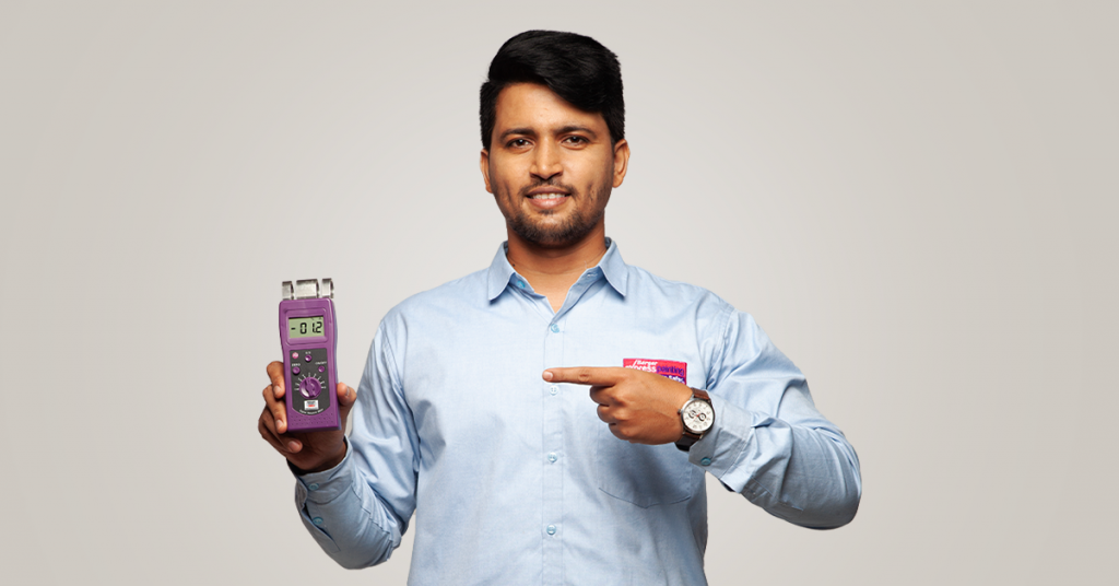 man-holding-berger-homeshield-moisture-meter-1024x536