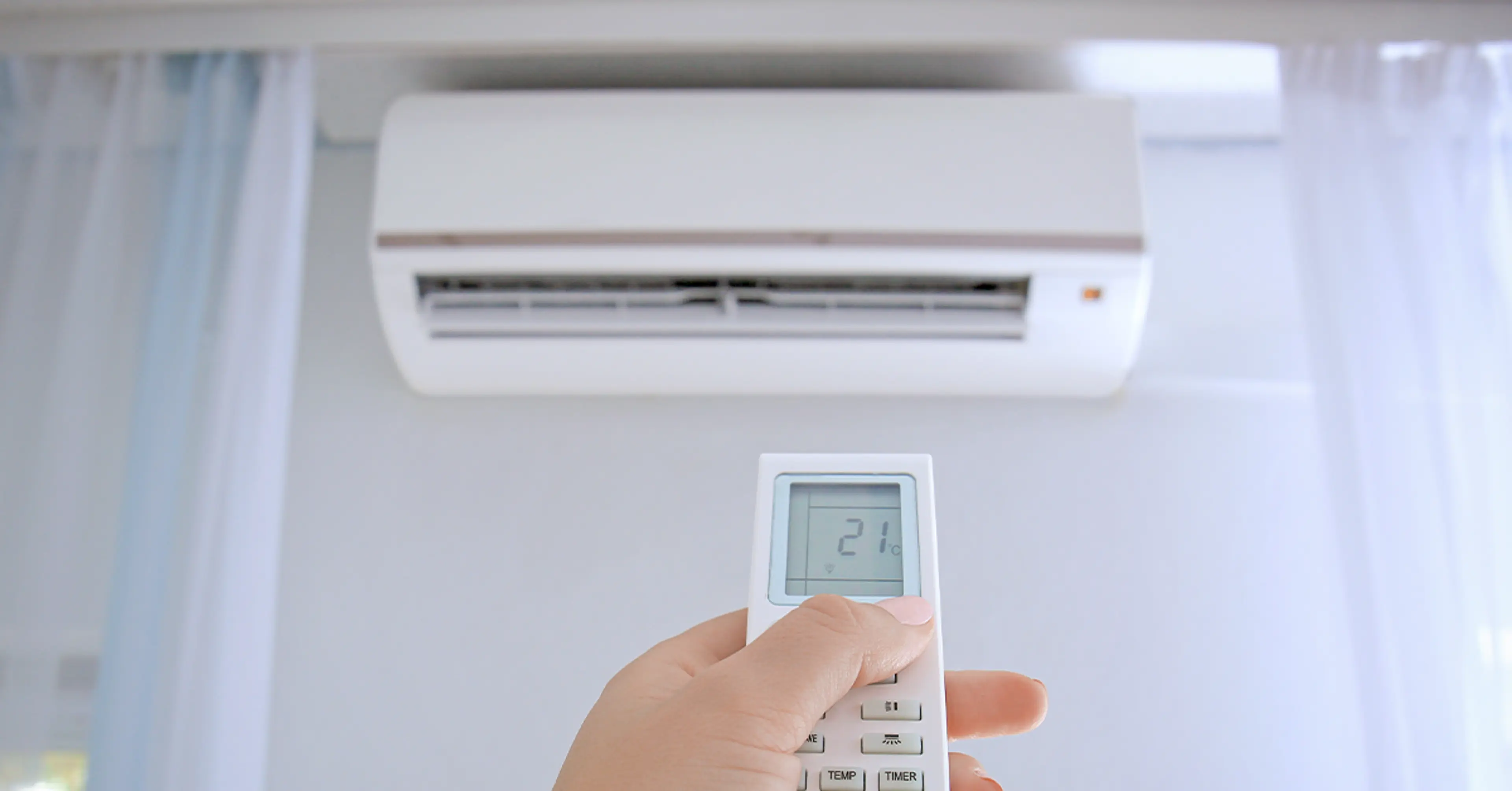 turning-on-the-air-conditioner-in-a-room