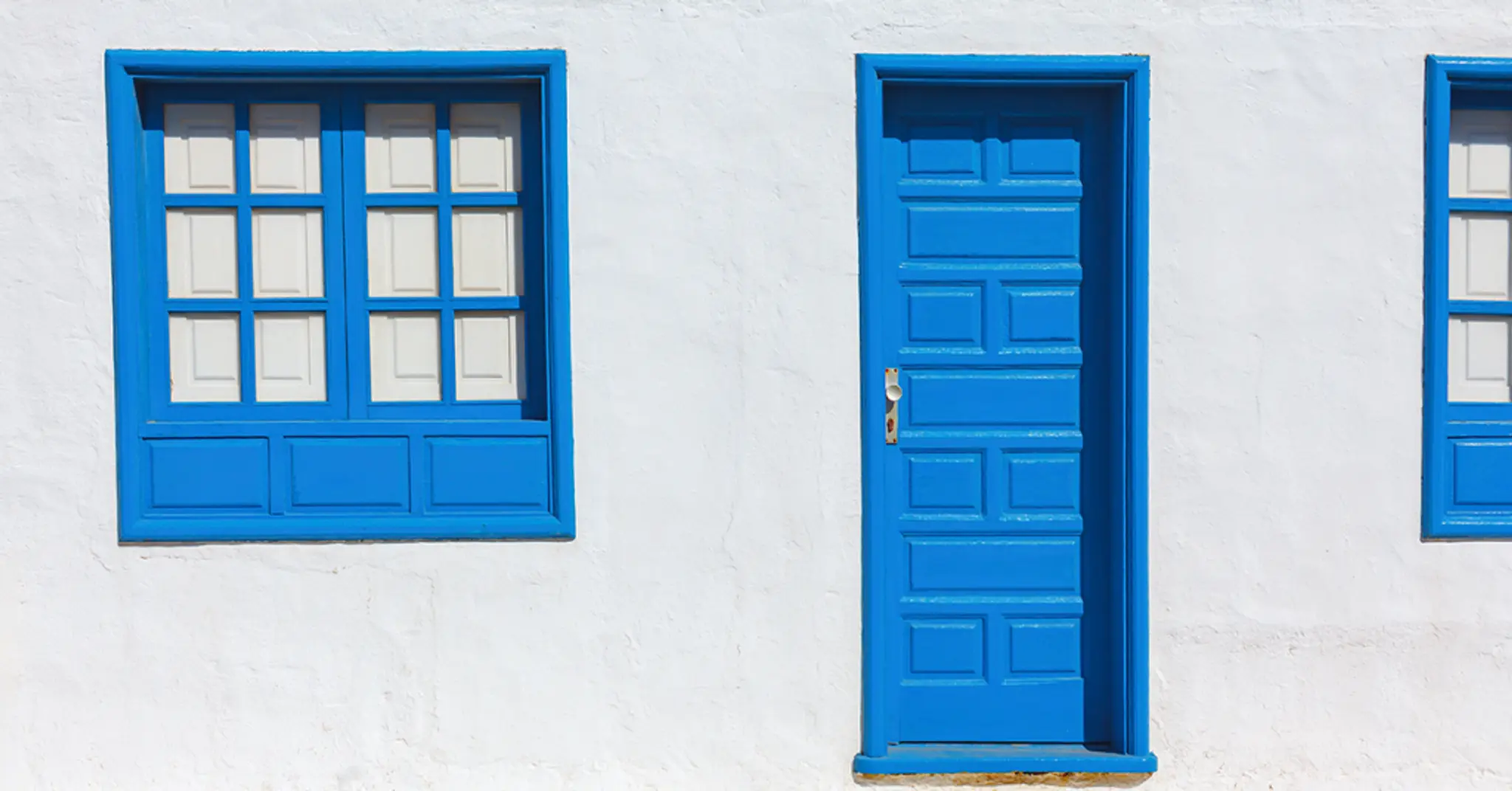 white-and-blue-wall-exteriors-1024x536